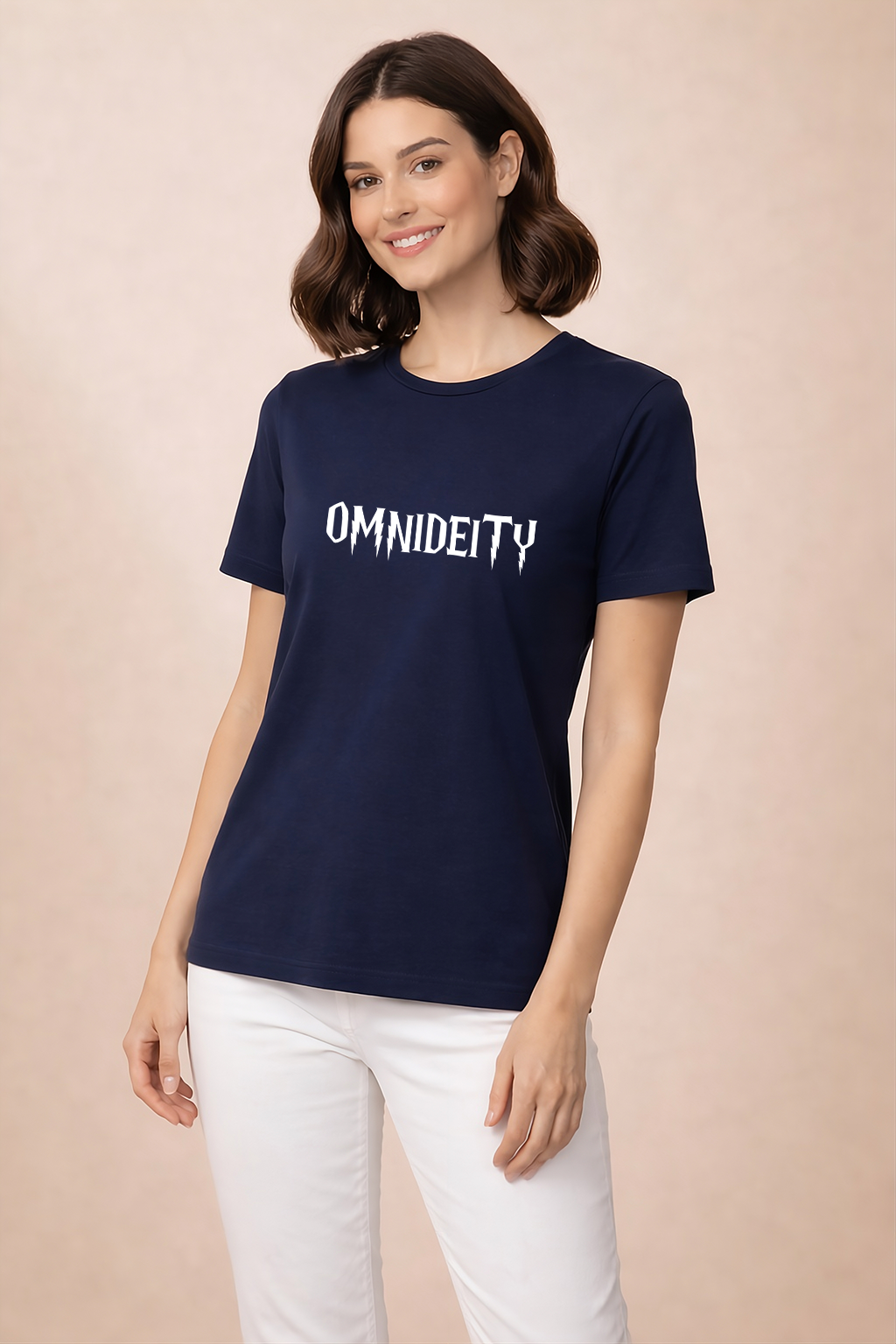 Woman wearing a Navy Blue t-shirt with 'OMNIDEITY' text on a beige background